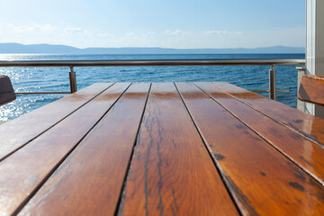  wooden table by the sea, close up