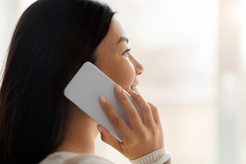 Phone Call. Closeup Of Young Asian Woman Having Mobile Conversation On Cellphone
