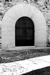 ancient door in caceres, spain
