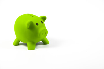 Green piggy bank on white background isolated