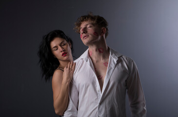 Sexy photo. Couple studio. Couple in love. Man and woman posing studio. Sensual. Dark. 