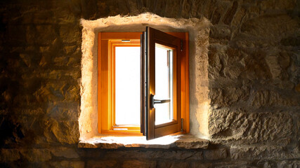 A open old window in the old wall
