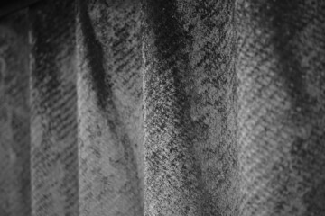 Closeup old slate sheet fence. BW photo