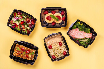 Catering food with healthy balanced diet delicious lunch box boxed take away deliver packed ready meal in black container dinner, meal, brakfast