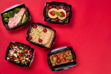 Catering food with healthy balanced diet delicious lunch box boxed take away deliver packed ready meal in black container dinner, meal, brakfast
