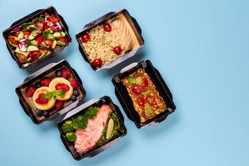 Catering food with healthy balanced diet delicious lunch box boxed take away deliver packed ready meal in black container dinner, meal, brakfast