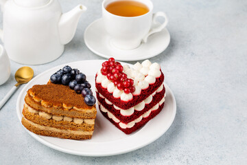 Sweet hearts. Red velvet cake and honey cake in heart shape.