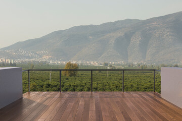 Fototapeta premium Balcony view of mountains. Landscape. Sunny Day. Terrace with a beautiful view. Background with beautiful landscape.