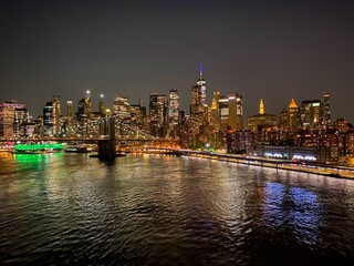 Fototapeta na wymiar Dumbo, Brooklynn, New York City, Lower Manhattan night View with Brooklyn Bridge & World Trade center from Manhattan Bridge