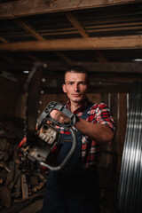 Fototapeta na wymiar worker with a chainsaw