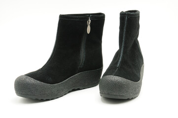 Youth women's suede shoes on a white background