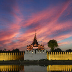 Night view to the illuminated walls of the Fort or Royal Palace with ancient watchtower in...
