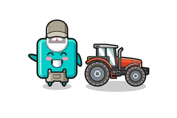 the weight scale farmer mascot standing beside a tractor