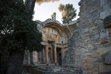Fototapeta premium Detail of the ruins of the Roman temple of Diana in the Jardins de la Fontaine (Gardens of the Fountain), Nîmes, South of France