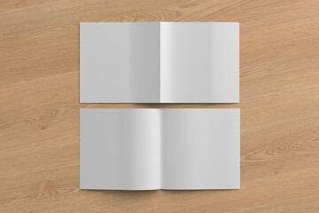 Square brochure or booklet mock up on wooden background.