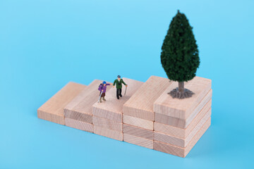 Miniature hikers looking for the origin of wood
