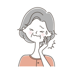 歯が痛いシニア女性