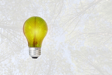 Green energy innovation light bulb. Mixed media.
