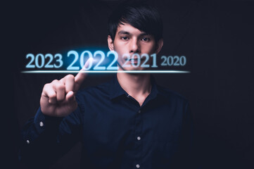People pointing at numbers, holograms, year 2022
