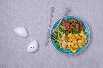 Baked gnocchi with stews and vegetables.