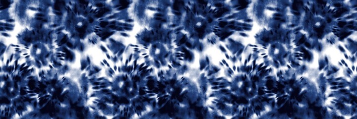 Seamless indigo tie dye 1970s funky hippie repeat pattern swatch motif for surface design and print. High quality illustration. Vibrant navy blue apparel material print. Psychedelic textile design.