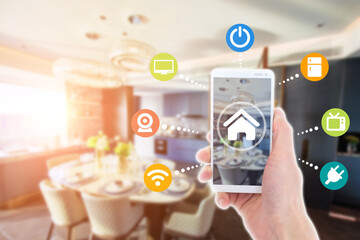 Smart home automation app on mobile with home interior in background. Internet of things concept at home. 