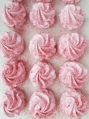 Homemade marshmallows in a white box. Marshmallow roses. A close-up shot.