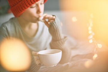 Kid face enjoying while eating marshmallow in the most happy season