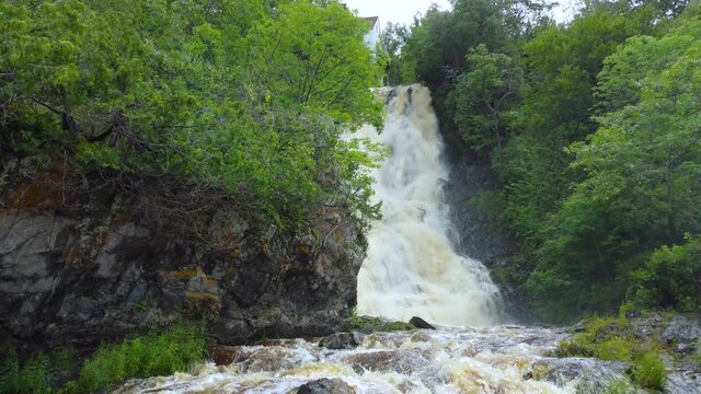 Aerial Closeup Approach on Beautiful Gushing Waterfall in Beaumont, Quebec