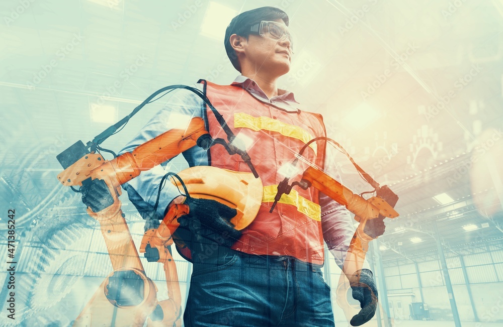 Poster mechanized industry robot arm and factory worker double exposure . concept of robotics technology fo