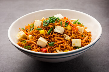 Schezwan or Szechuan paneer fried rice with