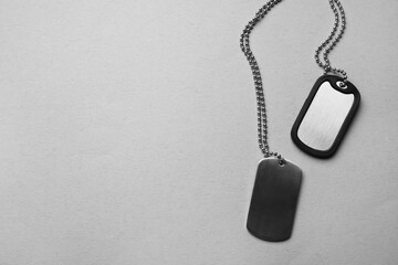 Fototapeta premium Military dog tags on grey background