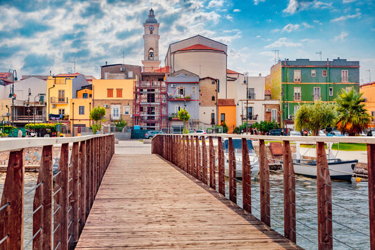 Attractive building on the shore of Lesina lake. Wonderful summer cityscape of Lesina town, Italy, Europe. Traveling concept background.