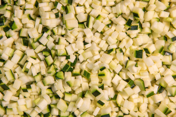 Chopped raw zucchini, close-up, diced zucchini macedonia