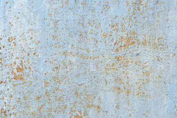 paint flakes on rusty metal sheet for background