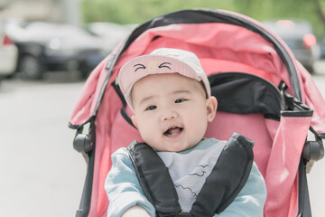 Baby enjoying sunshine outdoors