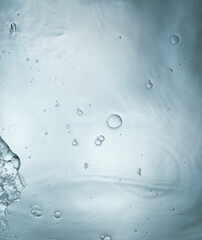 water liquid splash ripple wave in blue background