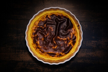 Parisian Flan, cutted classic tart served on a plate copy space