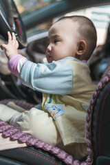 Baby in an outdoor car