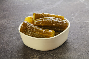 Marinated pickled cucumbers in the bowl