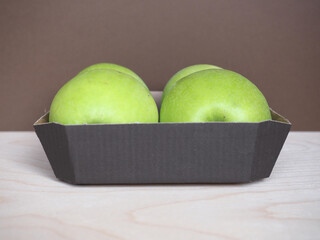 Granny Smith apple fruit food in cardboard basket