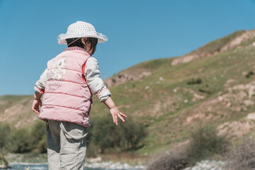 A girl playing outdoors