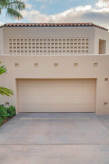 Garage exterior with beige walls and doors at La Jolla, California