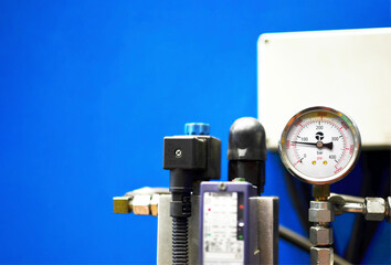 Mechanical measuring device, pressure gauges, manometer. Abstract industrial background