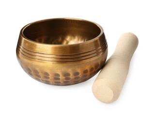 Golden singing bowl with mallet on white background. Sound healing