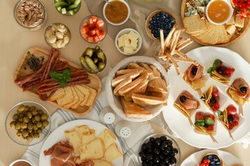 Dishes with different food on table, flat lay. Luxury brunch