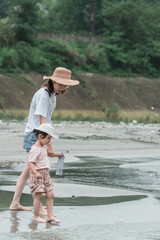 Mother and daughter playing with water in Dujiangyan