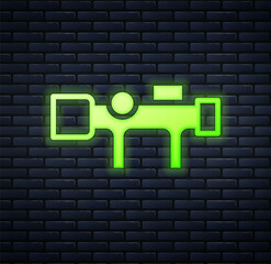 Glowing neon Sniper optical sight icon isolated on brick wall background. Sniper scope crosshairs. Vector