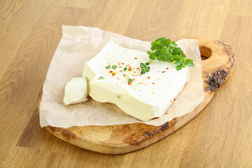 Greek Feta cheese over board