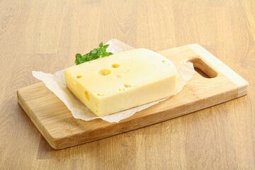 Maasdam cheese over the board